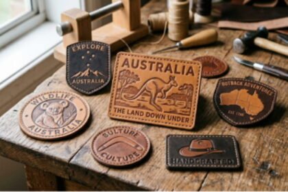 Different-shaped leather patches kept on a wooden table.